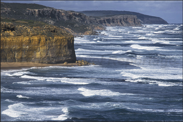 Great Ocean Road. During the day, the cliffs change color from yellow, in the morning, to the red in the evening Great Ocean Road. During the day, the cliffs change color from yellow, in the morning, to the red in the evening