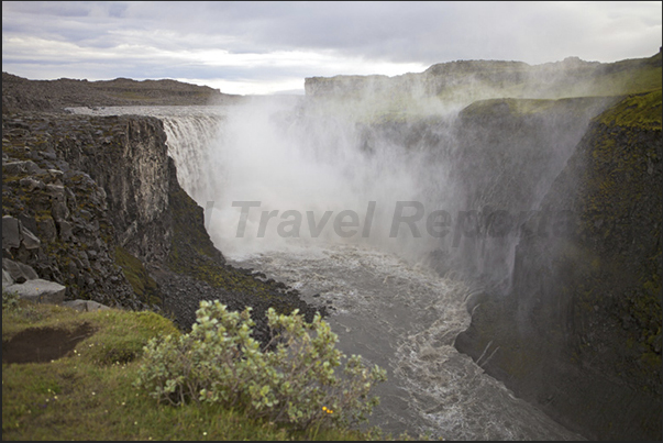 Dettifoss Selfoss Falls and the canyon generated by the waters of melting glaciers in the center of the island Dettifoss Selfoss Falls and the canyon generated by the waters of melting glaciers in the center of the island