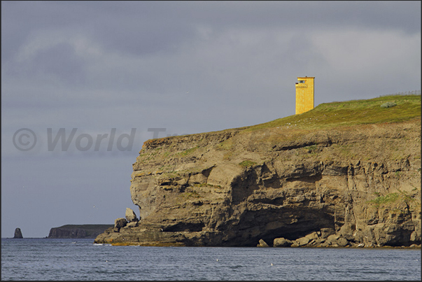 Husavik. The lighthouse at the entrance of the bay