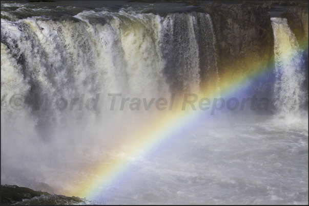 Rainbow over the Godafoss waterfalls, located on the road to the town of Akureyri Rainbow over the Godafoss waterfalls, located on the road to the town of Akureyri