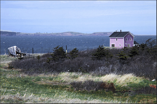 The houses, scattered on the islands, are inhabited mainly by peasants in the interior, and by fishermen along the coast