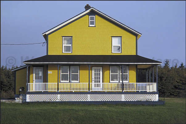 The wooden houses are painted in bright colors and often, the paint is what remains after having painted the fishing boats The wooden houses are painted in bright colors and often, the paint is what remains after having painted the fishing boats