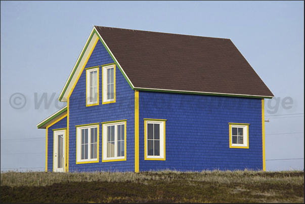 The wooden houses are painted in bright colors and often, the paint is what remains after having painted the fishing boats The wooden houses are painted in bright colors and often, the paint is what remains after having painted the fishing boats