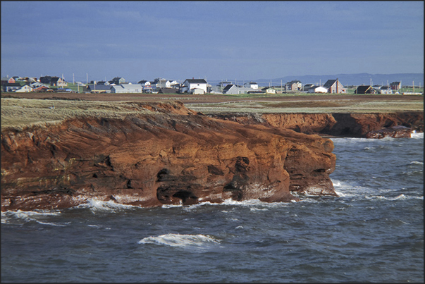 Cap aux Meules Island. The red cliffs along the West Coast Cap aux Meules Island. The red cliffs along the West Coast