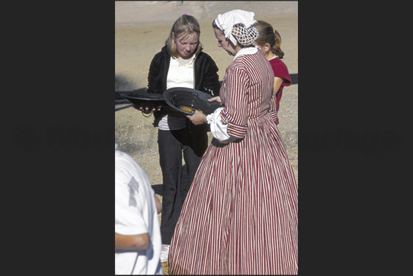The new gold miners, visiting Sovereign Hill, ask a help to the local people to understand how to find the gold The new gold miners, visiting Sovereign Hill, ask a help to the local people to understand how to find the gold