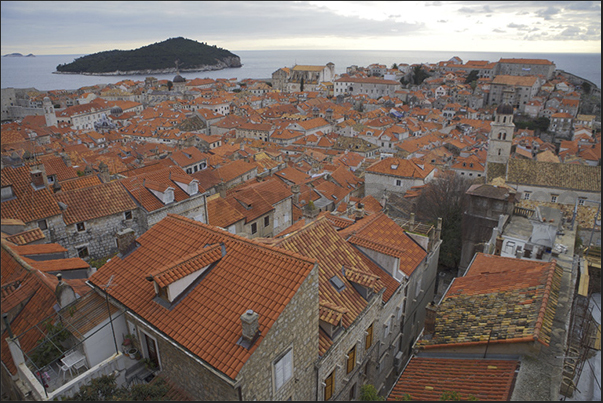 Dubrovnik (Ragusa). The medieval town surrounded by high fortified walls Dubrovnik (Ragusa). The medieval town surrounded by high fortified walls