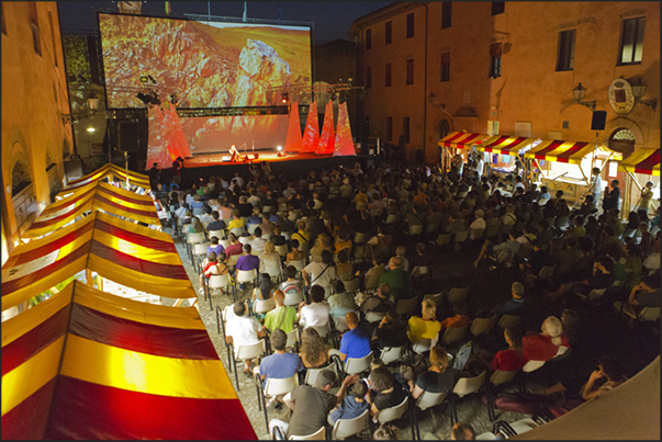 Screen shows, concerts, Aboriginal Art display, photo gallery and traditional market in the square of the Sforzesco castle