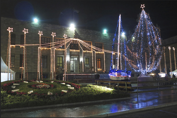 Rhodes town. The streets on the waterfront, shine under the Christmas lights just past Rhodes town. The streets on the waterfront, shine under the Christmas lights just past