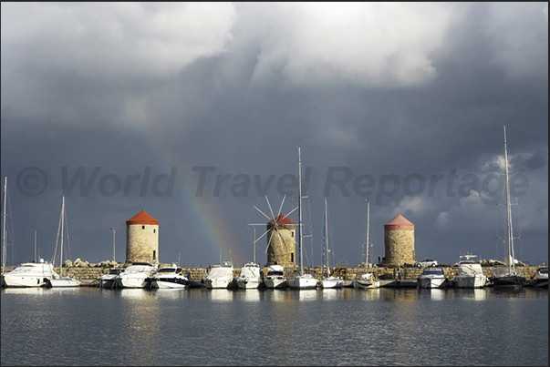 Rhodes town. Windmills in Mandraki, the main port of the island Rhodes town. Windmills in Mandraki, the main port of the island