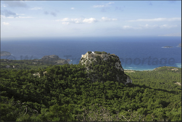 The castle of Monolithos built on Mount Akramitis surrounded by woods (West Coast)