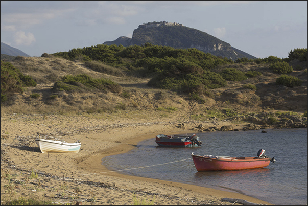 Bouka Bay and, on the horizon, the ruins of the ancient Venetian castle of Navarino