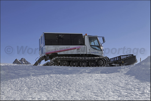 Tracked vehicle used for the White Cruise, an excursion to discover the glacier Tracked vehicle used for the White Cruise, an excursion to discover the glacier