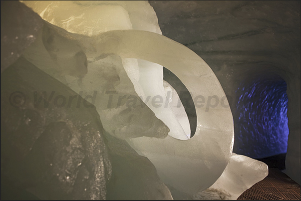 Inside the cave carved into the glacier, they were created several sculptures as this mammoth Inside the cave carved into the glacier, they were created several sculptures as this mammoth