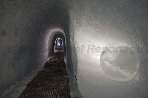 The corridors dug into the glacier leading to the halls of ice sculptures The corridors dug into the glacier leading to the halls of ice sculptures