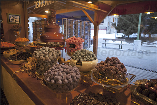 Biscuits, cakes and a chocolate fountain in one of the shop most visited by tourists Biscuits, cakes and a chocolate fountain in one of the shop most visited by tourists