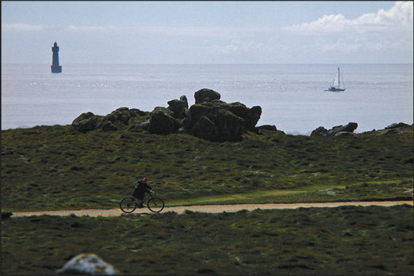 On the horizon, the Jument lighthouse, one of the most famous lighthouses of France