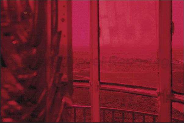 The room of the optical unit of the Stiff lighthouse, signaling a very dangerous coast, has red glass at 360 degree The room of the optical unit of the Stiff lighthouse, signaling a very dangerous coast, has red glass at 360 degree