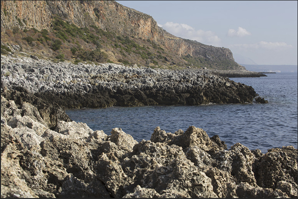 The cliffs of Porto Gialos. West coast of the peninsula The cliffs of Porto Gialos. West coast of the peninsula