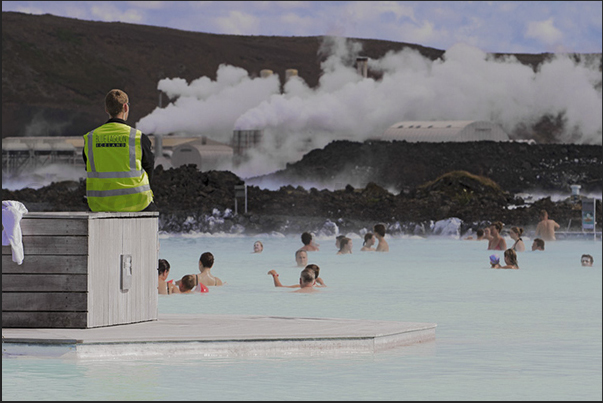 Blue Lagoon. The large public swimming pool with warm waters and white sludge used as a beneficial treatment for the skin Blue Lagoon. The large public swimming pool with warm waters and white sludge used as a beneficial treatment for the skin