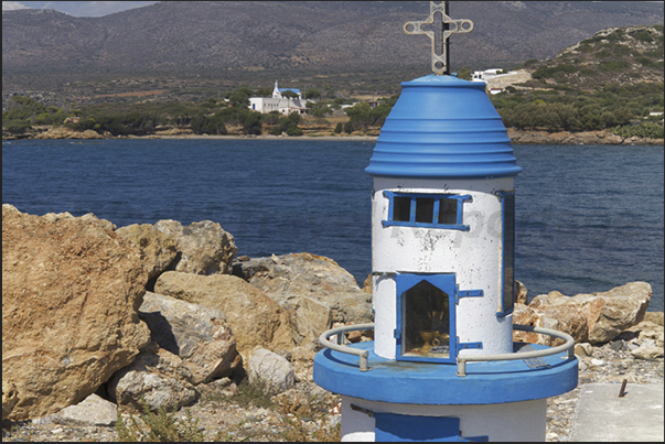 Port of Paralia (near the village of Archangelos). A small votive church
