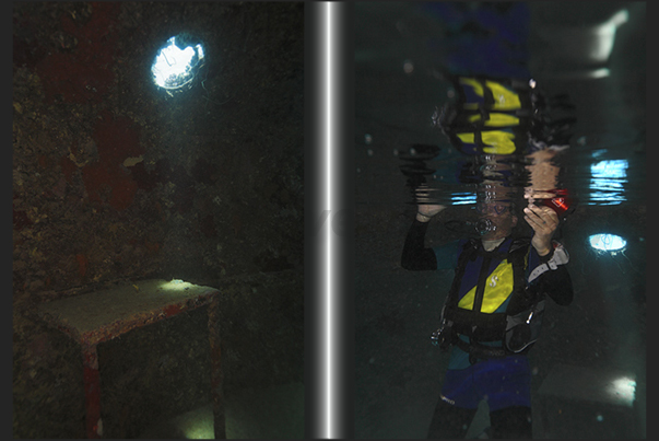 Precontinent II. The interior of the dome. A small table in iron welded to the dome wall and the air bubble generated by divers Precontinent II. The interior of the dome. A small table in iron welded to the dome wall and the air bubble generated by divers