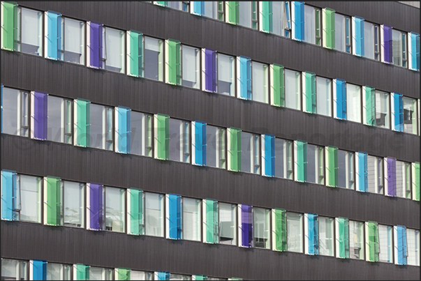 Windows of a building seem a mural Windows of a building seem a mural