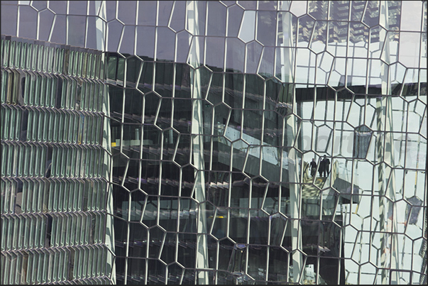 The large glass walls of the Harpa Concert Hall and Conference Centre The large glass walls of the Harpa Concert Hall and Conference Centre