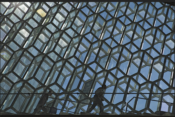 The large glass walls of the Harpa Concert Hall and Conference Centre The large glass walls of the Harpa Concert Hall and Conference Centre