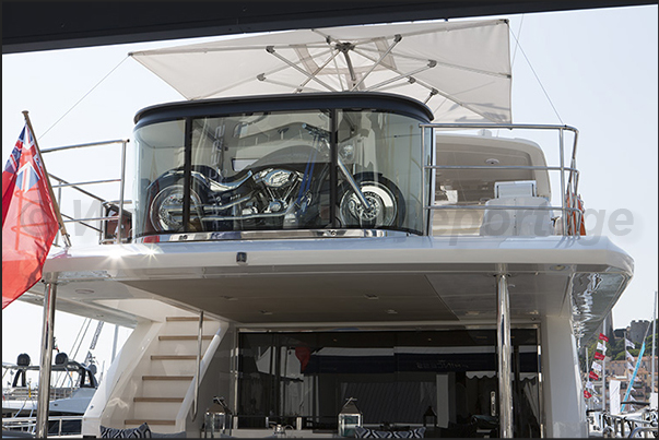 A transparent garage for motorcycles, is very useful not to forget the bike on the pier of the port A transparent garage for motorcycles, is very useful not to forget the bike on the pier of the port