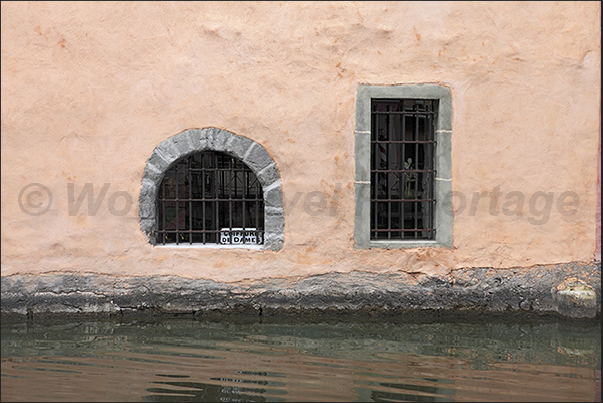 At one time, the people lived along the canals that crossed the village At one time, the people lived along the canals that crossed the village