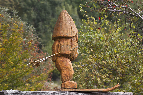 In the village of Alpe Artignaga, a craftsman produces wooden sculptures In the village of Alpe Artignaga, a craftsman produces wooden sculptures