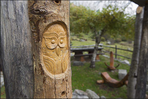 In the village of Alpe Artignaga, a craftsman produces wooden sculptures In the village of Alpe Artignaga, a craftsman produces wooden sculptures