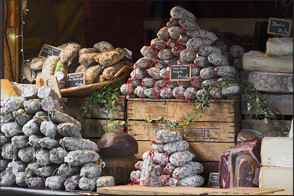 A stand with fragrant and delicious local sausages and salami A stand with fragrant and delicious local sausages and salami