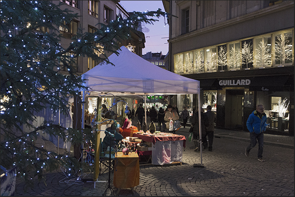 Stands of the Christmas market on the Place de la Palud