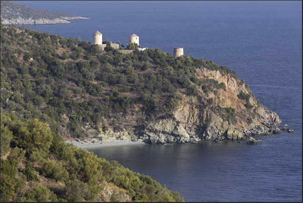 Ancient windmills on the coast near the town of Paralia Tyrou