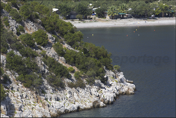 Beach in the bay before arriving to the town of Arkadiko Horio Beach in the bay before arriving to the town of Arkadiko Horio