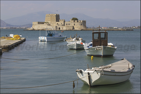 The Bourtzi fortress in front of the harbor of Nafplio The Bourtzi fortress in front of the harbor of Nafplio
