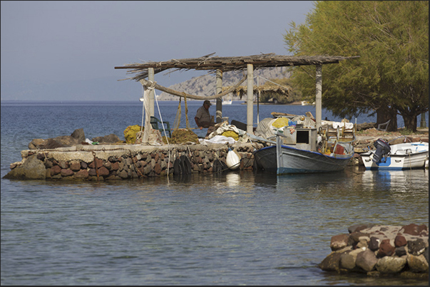 Fishermen in the Vathy bay along the peninsula of Methana Fishermen in the Vathy bay along the peninsula of Methana