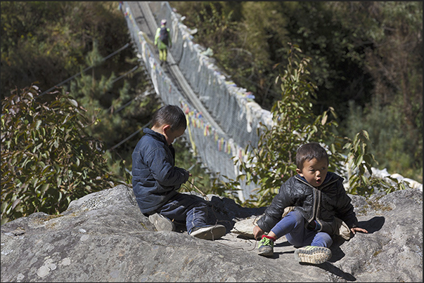 Phakding village (2610 m). Suspension Bridge before arriving at the village Phakding village (2610 m). Suspension Bridge before arriving at the village