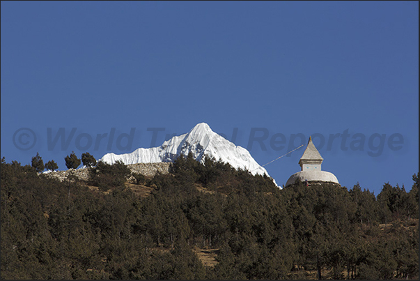 A Stupa of prayer and behind, Mount Tabouche (6495 m)