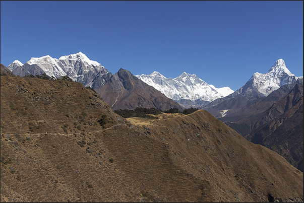 An unique show in the world. From right: Ama Dablam 6814 m, Lhotse 8516 m, Everest 8848 m, Tabuche 6495 m An unique show in the world. From right: Ama Dablam 6814 m, Lhotse 8516 m, Everest 8848 m, Tabuche 6495 m