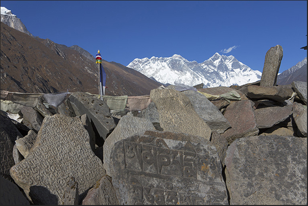 Prayers engraved in stone at Tengboche (3860 m) Prayers engraved in stone at Tengboche (3860 m)
