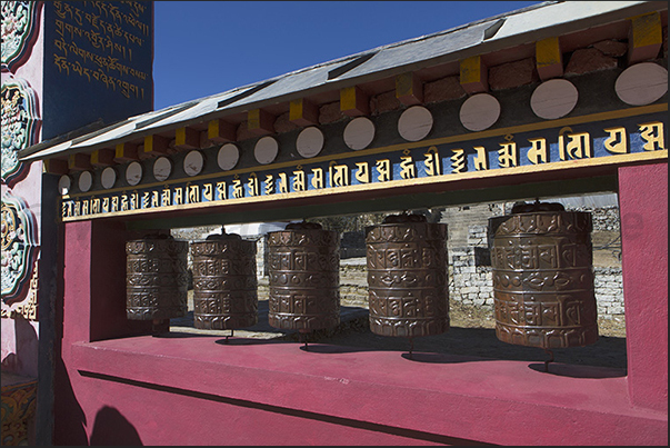 Prayer cylinders at the entrance to Tengboche Monastery Prayer cylinders at the entrance to Tengboche Monastery