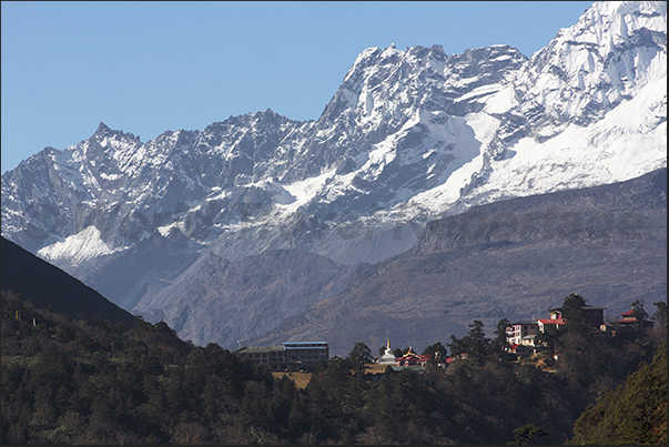 Past the valley, the monastery of Tengboche is now faraway Past the valley, the monastery of Tengboche is now faraway