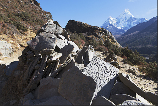 Prayers written in stone on the path to Pangboche Prayers written in stone on the path to Pangboche