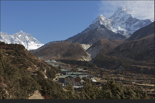 Village of Pangboche (3930 m) with behind Mount Ama Dablam (6814 m) and the horizon Mount Lhotse (8516 m) Village of Pangboche (3930 m) with behind Mount Ama Dablam (6814 m) and the horizon Mount Lhotse (8516 m)