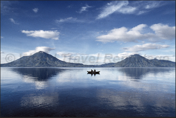 Lake Atitlan (1500 m.s.l.). It is surrounded by volcanoes and 12 villages that can be reached by boat Lake Atitlan (1500 m.s.l.). It is surrounded by volcanoes and 12 villages that can be reached by boat