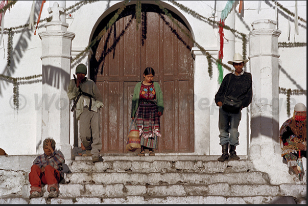 Chichicastenango: some villagers (at over 2000 m.s.l.) are waiting for the opening of the Calvary Church in the central square Chichicastenango: some villagers (at over 2000 m.s.l.) are waiting for the opening of the Calvary Church in the central square