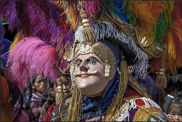 Chichicastenango. This mask it symbolizes the arrival of the Spanish conquistadors when the indians show off their wealth Chichicastenango. This mask it symbolizes the arrival of the Spanish conquistadors when the indians show off their wealth