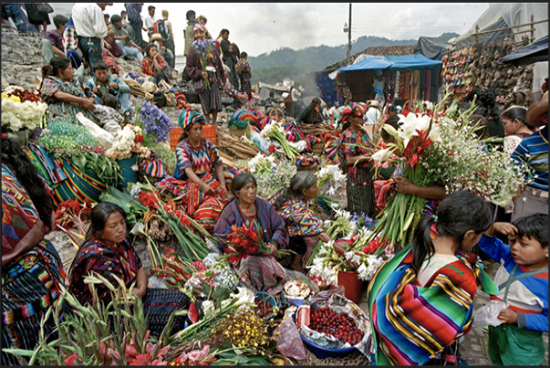 Chichicastenango. The Indians come from distant villages to selling crafts, pottery, textiles, food, flowers, medicinal plants, pets